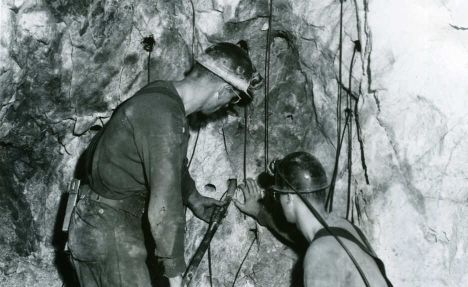 explosives being put into the holes